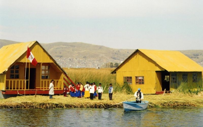 Lake Titicaca Floating island flag paddling